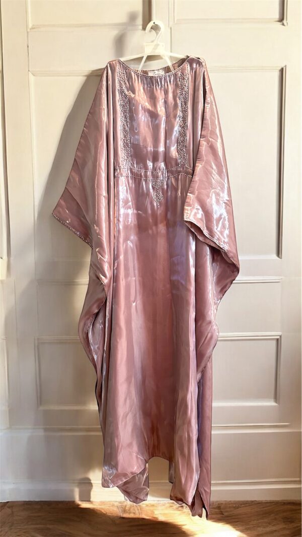 "Luxury glitter butterfly abaya crafted for upscale events, showcasing exquisite modest fashion."