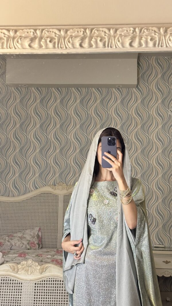 "Luxury glitter butterfly abaya crafted for upscale events, showcasing exquisite modest fashion."